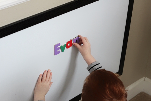 Unscramble letters of name and spell name on the whiteboard