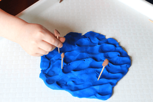 Make Cattails with play dough and add to pond