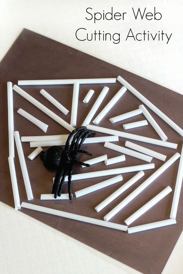 Spider web cutting activity for preschoolers. A scissor skills activity with straws and contact paper.