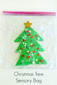A Christmas sensory activity for toddlers and preschoolers. An interactive sensory bag that helps develop fine motor skills.