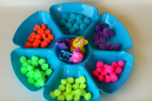 Color sorting with pom poms