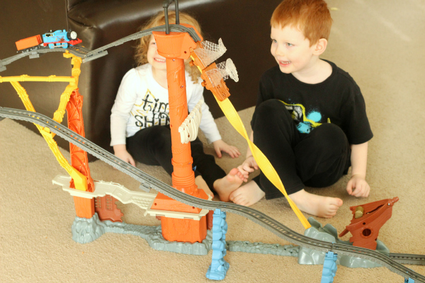 Learning STEM concepts while playing with a train and train track.