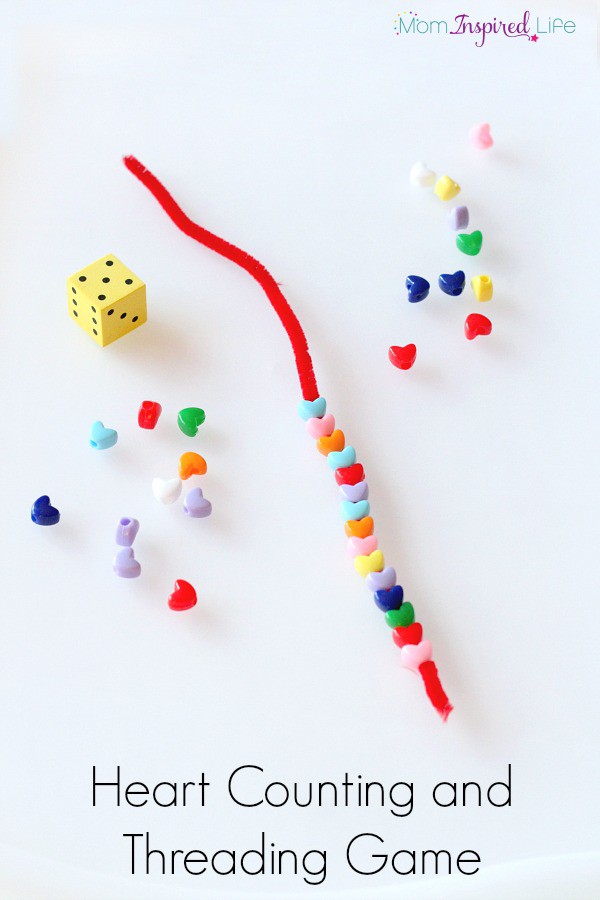 Heart Counting Game and Threading Activity for Valentine's Day. A preschool math and fine motor activity that your kids will really enjoy!