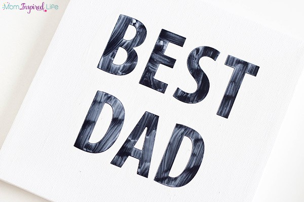 Sticker resist painting that kids can make for Dad on Father's Day.