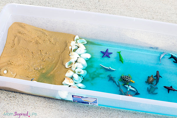 Beach sensory bin for toddlers and preschoolers.