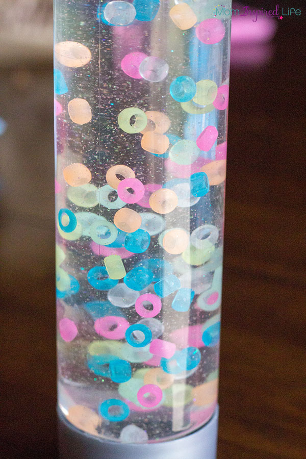 Slow falling beads sensory bottle that also glows in the dark.