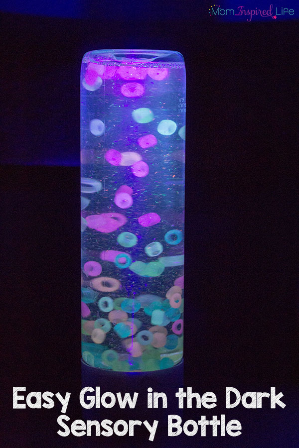 My kids loved this awesome glow in the dark beads sensory bottle. It's actually pretty easy to make too! A cool glowing calm down bottle for kids.