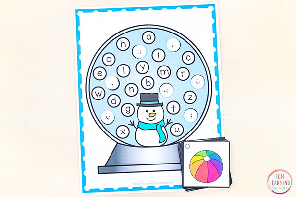 Snow globe mat with lowercase alphabet letters all over it. Beginning sounds picture cards to go with the mats.