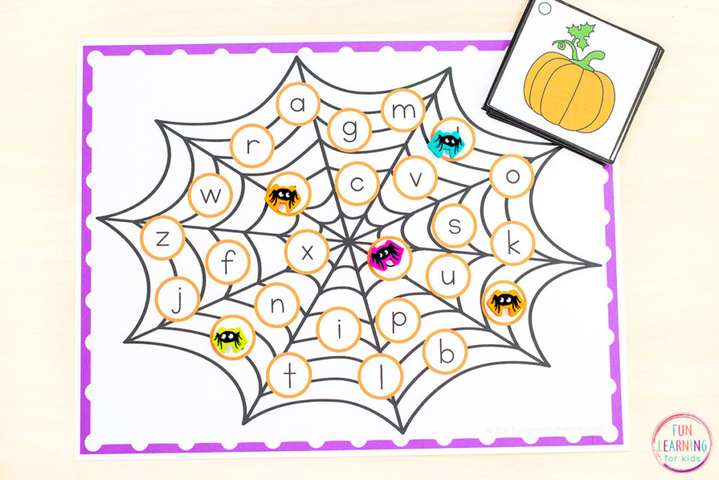 A printable spider theme alphabet and letter sounds game for kids.