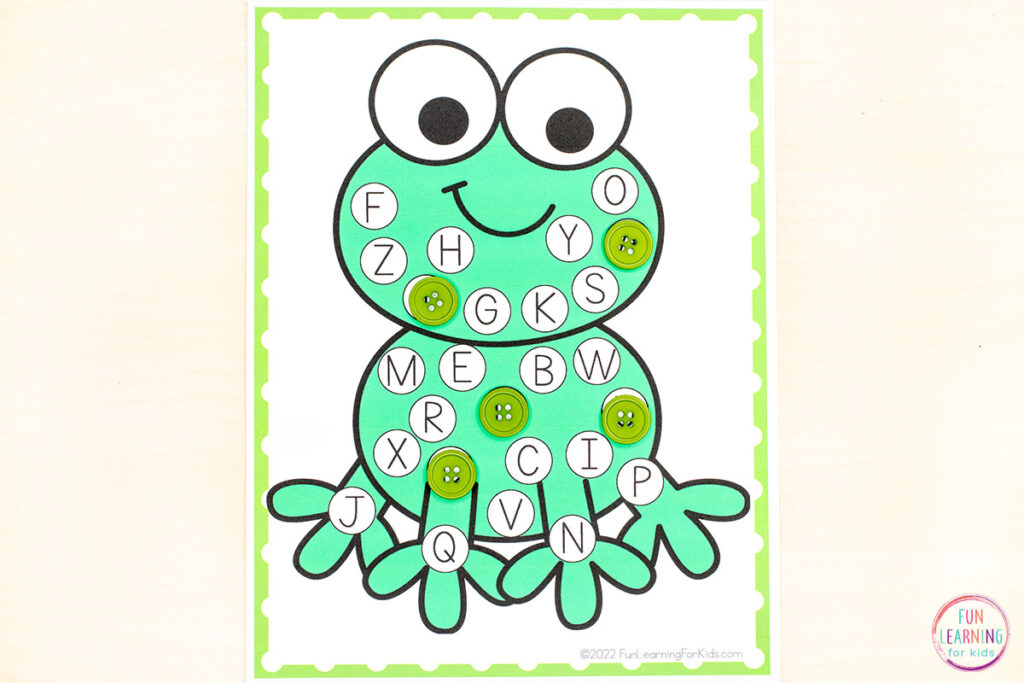 Frog alphabet mats that have a large frog covered in all the letters of the alphabet. Students pick a beginning sound picture card from the stack and cover the corresponding letter on the mat.