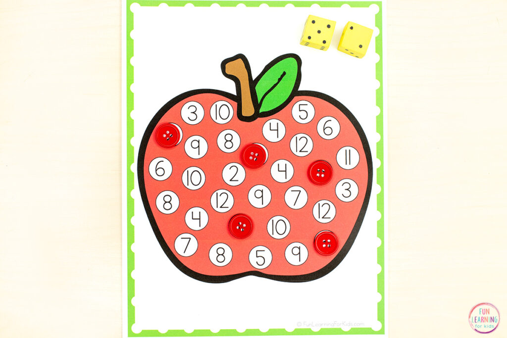 Roll two dice, add the numbers together and then cover the corresponding spot on the apple. Play continues until all spots on the apple are covered.