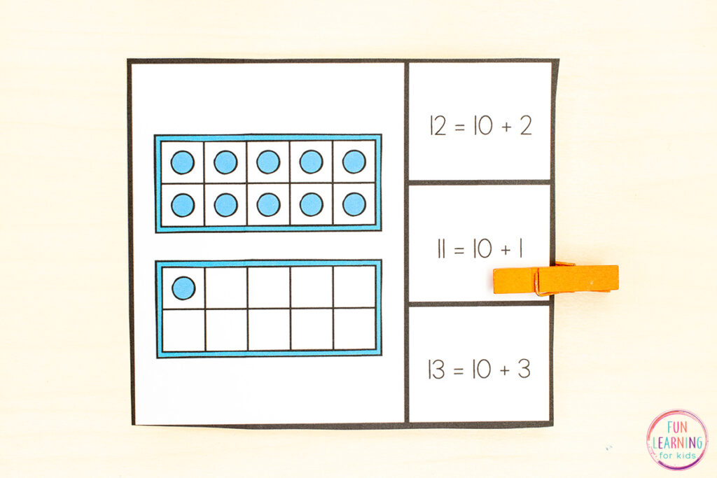 A hands-on teen numbers math activity for learning teen numbers and building fine motor skills at the same time. Look at the ten frames on the card and clip the corresponding equation.