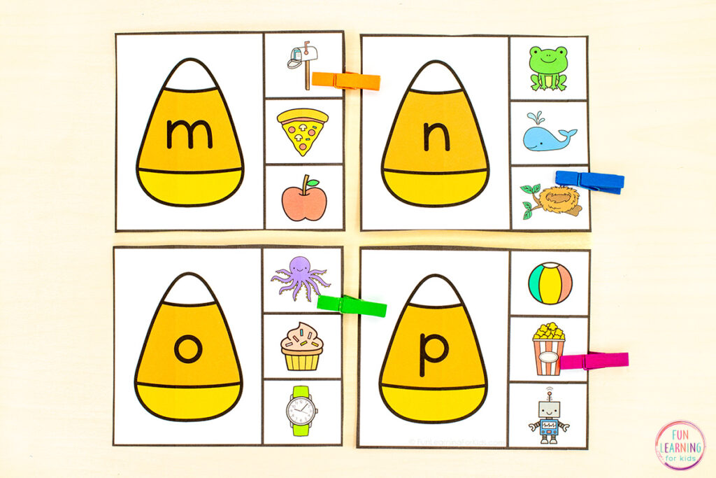 Free printable candy corn theme alphabet activity for learning letters and sounds.