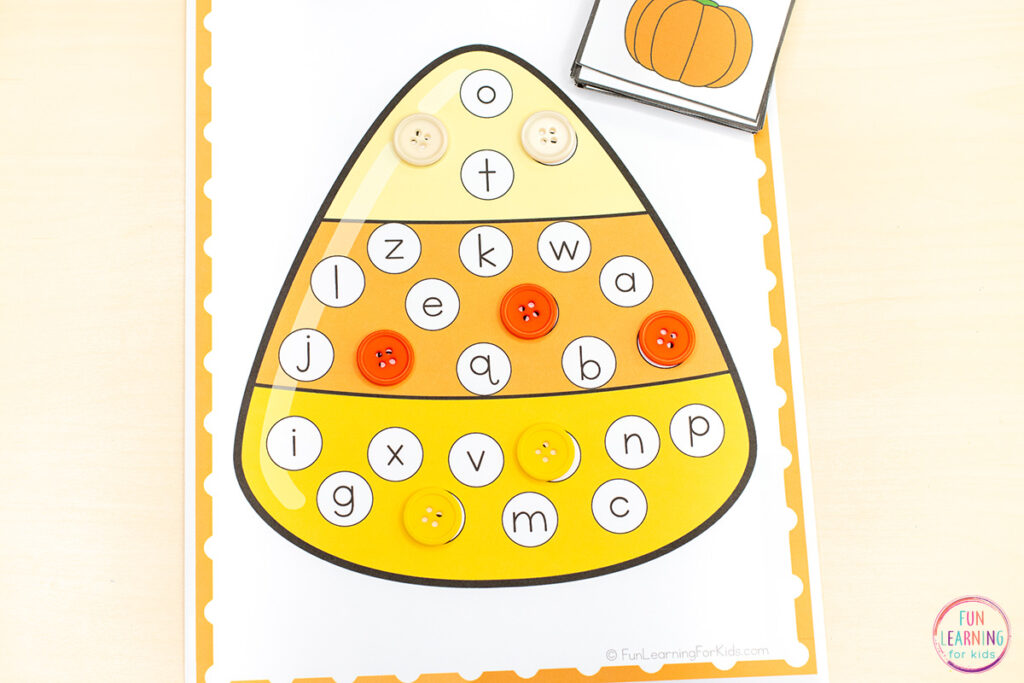 Candy corn letter learning activity for Halloween. 