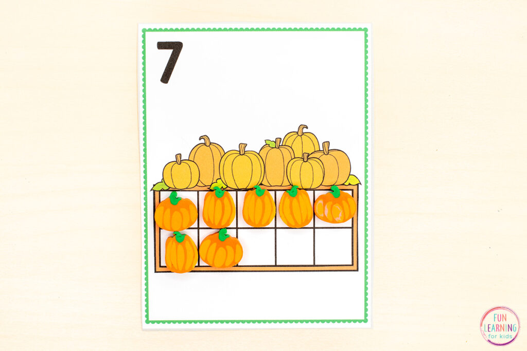 Pumpkin theme counting activity for kids. Card with a number in the top left corner and an empty ten-frame or twenty frame in the center. Pumpkin clip art is shown above the frame.