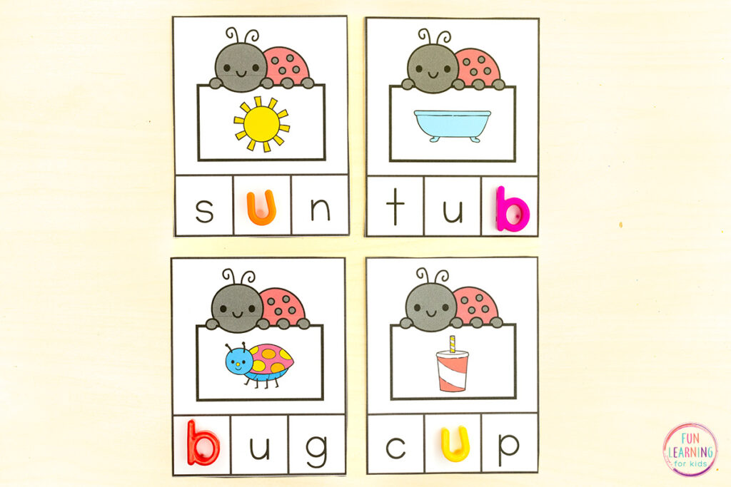 Ladybug CVC missing sound task cards for spring phonics centers.