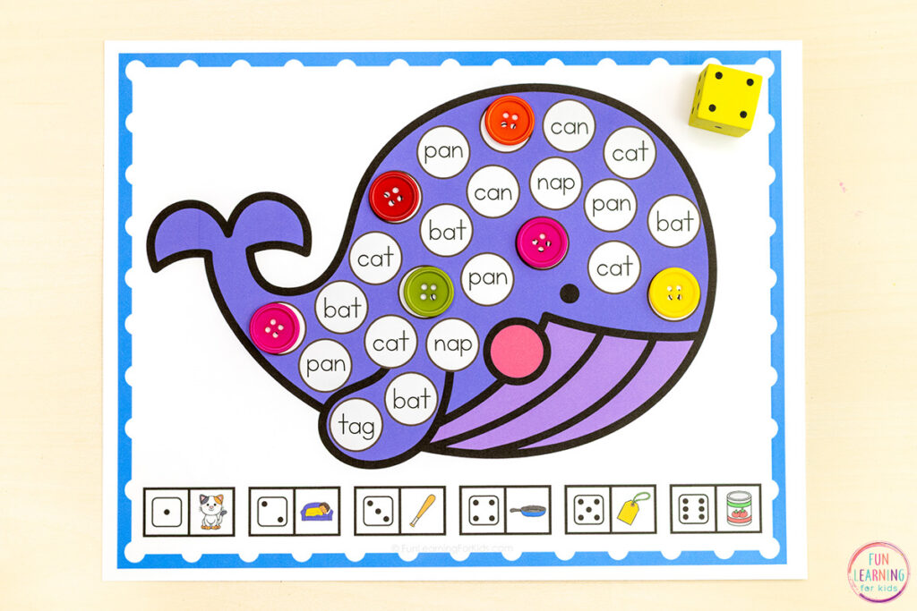 Learning to read CVC words is fun when you use these whale theme CVC roll and cover games for kids.