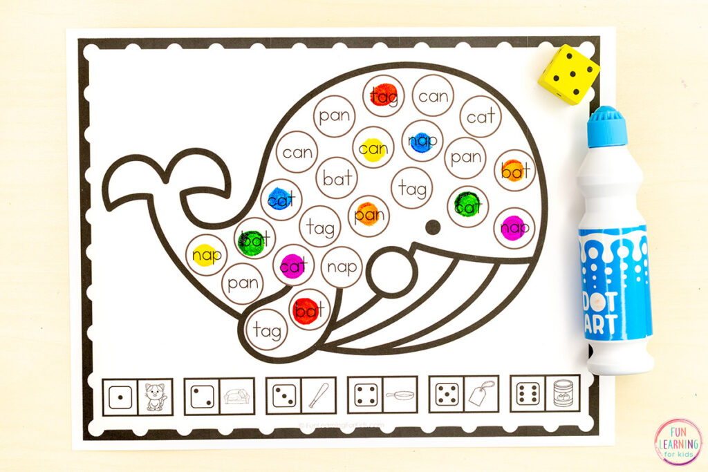 Whale CVC word roll and cover game for phonics skills practice in kindergarten and first grade.