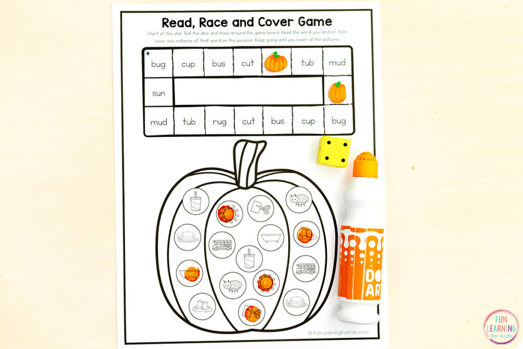 Fall pumpkin roll and read phonics games for practicing CVC word fluency in kindergarten.