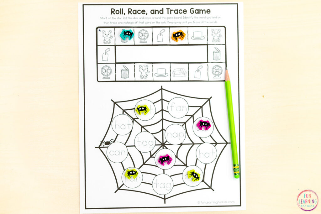 Spider web roll and read phonics games for practice with decoding CVC words and building reading fluency in kindergarten literacy centers or small groups.